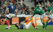 13 February 2010; Alexis Palisson, France, falls to the ground after an alleged kick by Jerry Flannery, 2, Ireland. RBS Six Nations Rugby Championship, France v Ireland, Stade de France, Saint Denis, Paris, France. Picture credit: Brendan Moran / SPORTSFILE *** Local Caption ***