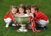 15 February 2010; GAA stars of the future, from left to right, Chloe O'Neill, Eabha Last, Brendan Noble and Joshua Noone with the Sam Maguire Cup at the announcement of a new three year GAA Football Championship partnership with SuperValu and its 231 retail partners, beginning for the 2010 season. Croke Park, Dublin. Picture credit: Stephen McCarthy / SPORTSFILE