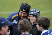 15 February 2010; Cian Milofsky, from Rathfarnham, Co. Dublin has his picture taken with Leinster's Stan Wright after a squad training open day ahead of their Celtic League match against Scarlets on Saturday. RDS, Ballsbridge, Dublin. Photo by Sportsfile