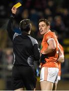 5 March 2016; Referee Maurice Deegan issues Charlie Vernon, Armagh, with a yellow card. Allianz Football League, Division 2, Round 4, Cavan v Armagh, Kingspan Breffni Park, Cavan. Picture credit: Oliver McVeigh / SPORTSFILE