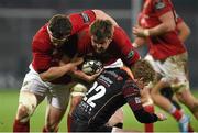 5 March 2016; Dave Foley, Munster, supported by team-mate Mike Sherry, is tackled by Angus O'Brien, Newport Gwent Dragons. Guinness PRO12, Round 17, Munster v Newport Gwent Dragons. Thomond Park, Limerick. Picture credit: Diarmuid Greene / SPORTSFILE