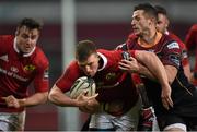 5 March 2016; Andrew Conway, Munster, is tackled by Jason Tovey, left, and Phil Price, Newport Gwent Dragons. Guinness PRO12, Round 17, Munster v Newport Gwent Dragons, Thomond Park, Limerick. Picture credit: Brendan Moran / SPORTSFILE