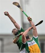 6 March 2016; Tom Condon, Limerick, in action against Jason Sampson, Offaly. Allianz Hurling League, Division 1B, Round 3, Offaly v Limeick. O'Connor Park, Tullamore, Co. Offaly. Picture credit: David Maher / SPORTSFILE
