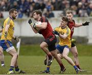 6 March 2016; Gerard Collins Down, is tackled by Cian Connolly, right, and Senan Kilbride, Roscommon. Allianz Football League, Division 1, Round 4, Roscommon v Down. Glennon Brothers Pearse Park, Longford. Picture credit: Sam Barnes / SPORTSFILE