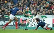 13 February 2010; Keith Earls, Ireland, in action against theirry Dusautoir, left, and Thomas Domingo, France. RBS Six Nations Rugby Championship, France v Ireland, Stade de France, Saint Denis, Paris, France. Picture credit: Brendan Moran / SPORTSFILE