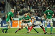 13 February 2010; Keith Earls, Ireland, is tackled by Dimitri Szarzewski and Mathieu Bastareaud, right, France. RBS Six Nations Rugby Championship, France v Ireland, Stade de France, Saint Denis, Paris, France. Picture credit: Brian Lawless / SPORTSFILE *** Local Caption ***