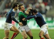 13 February 2010; Tommy Bowe, Ireland, is tackled by David Marty, left, and Morgan Parra, France. RBS Six Nations Rugby Championship, France v Ireland, Stade de France, Saint Denis, Paris, France. Picture credit: Brian Lawless / SPORTSFILE *** Local Caption ***