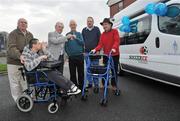 18 February 2010; Johnny Giles was present at St Michael’s House, in Sallow Wood, to present a special new bus to the charity, which provides community-based services to 1,685 children and adults with an intellectual disability and their families. The new bus is a gift from Soccerex, a global leader in the business of football. The CEO of Soccerex is Duncan Revie, son of legendary Leeds United Manager Don Revie. Duncan’s wife Rita Whelan is the sister of Noel Whelan, a service user with St. Michael’s House. Noel was among the service users in attendance to celebrate the arrival of the new bus! At the presentation is Johnny Giles with Residents of St. Michael's House, from left, Paul McDonald, from Coolock, with his fatherJoe McDonald, left, Gerard McAuley, from Killester, Kevin Hughes, from Raheny, and Noel Whelan, from Santry. St Michael’s House, Sallowood, Dublin. Picture credit: Brian Lawless / SPORTSFILE