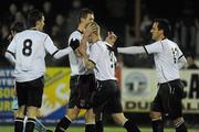 18 February 2010; Dundalk's John Flood, 9, is congratulated by his team-mates, from left to right, Alan Cawley, Gary Breen and Neale Fenn after scoring his side's first goal. Jim Malone Cup, Dundalk v Drogheda United, Oriel Park, Dundalk, Co. Louth. Picture credit: Oliver McVeigh / SPORTSFILE