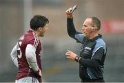 6 March 2016; Damien Comer, Galway, is shown a black card by referee Conor Lane. Allianz Football League, Division 2, Round 4, Galway v Meath, Pearse Stadium, Galway. Picture credit: Ray Ryan / SPORTSFILE