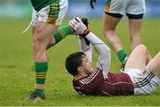 6 March 2016; Damien Comer, Galway, holds onto the boot of Mickey Burke, Meath. Allianz Football League, Division 2, Round 4, Galway v Meath, Pearse Stadium, Galway. Picture credit: Ray Ryan / SPORTSFILE