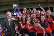 7 March 2016; Scoil Mhuire, Carrick on Suir, Tipperary, team captain Aoife Murray lifts the cup as her team-mates celebrate. Lidl All Ireland Senior A Post Primary Schools Championship Final, Coláiste Iosagain, Stillorgan, Dublin v Scoil Mhuire, Carrick on Suir, Tipperary. Nowlan Park, Kilkenny. Picture credit: Matt Browne / SPORTSFILE