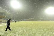 20 February 2010; Kilkenny manager Brian Cody inspects the pitch amid falling snow before the game was called off. Allianz GAA Hurling National League, Division 1 Round 1, Tipperary v Kilkenny, Semple Stadium, Thurles, Co. Tipperary. Picture credit: Brendan Moran / SPORTSFILE