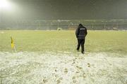20 February 2010; Kilkenny manager Brian Cody inspects the pitch amid falling snow before the game was called off. Allianz GAA Hurling National League, Division 1 Round 1, Tipperary v Kilkenny, Semple Stadium, Thurles, Co. Tipperary. Picture credit: Brendan Moran / SPORTSFILE