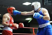 20 February 2010; Ken Egan, red, and Disha Gezim, blue, exchange punches during their 81kg bout. National Mens and Womens Elite National Boxing Championships, Preliminary Rounds, National Stadium, Dublin. Photo by Sportsfile