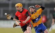 21 February 2010; Brendan Ennis, Down, in action against Alan Brigdale, Clare. Allianz GAA Hurling National League, Division 2 Round 1, Clare v Down. Cusack Park, Ennis, Co. Clare. Picture credit: Diarmuid Greene / SPORTSFILE