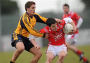 21 February 2010; Adrian Reid, Louth, in action against Padraig Howard, Dublin City University. O'Byrne Cup Final, Louth v Dublin City University. Dowdallshill, Dundalk, Co. Louth. Photo by Sportsfile