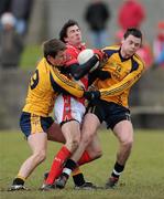 21 February 2010; Brian White, Louth, in action against Conor Rafferty, left, and Donal Shine, Dublin City University. O'Byrne Cup Final, Louth v Dublin City University. Dowdallshill, Dundalk, Co. Louth. Photo by Sportsfile