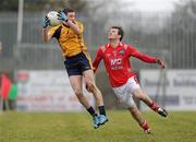 21 February 2010; Neil Collins, Dublin City University, in action against Mark Brennan, Louth. O'Byrne Cup Final, Louth v Dublin City University. Dowdallshill, Dundalk, Co. Louth. Photo by Sportsfile