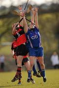 21 February 2010; Stacey Redmond and Katie Power, hidden, WIT, in action against Grainne Kenneally, UCC. Ashbourne Cup Final, Waterford Institute of Technology v University College Cork. Cork Institute of Technology, Cork. Picture credit: Stephen McCarthy / SPORTSFILE