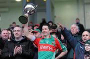 21 February 2010; Peadar Gardiner, Mayo, lifts the FBD cup. FBD League Final, Mayo v Galway. McHale Park, Castlebar, Co. Mayo. Picture credit: Ray Ryan / SPORTSFILE
