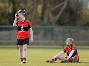 21 February 2010; Julie Brien, left, and Orla Cotter, UCC, show their dejection following their defeat to WIT. Ashbourne Cup Final Waterford Institute of Technology v University College Cork. Cork Institute of Technology, Cork. Picture credit: Stephen McCarthy / SPORTSFILE