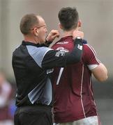 6 March 2016; Galway's Johnny Heaney has a chain removed from around his neck by referee Conor Lane. Allianz Football League, Division 2, Round 4, Galway v Meath, Pearse Stadium, Galway. Picture credit: Ray Ryan / SPORTSFILE