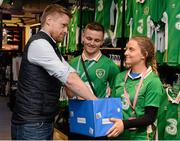 10 March 2016; Irish soccer legend Damien Duff was on hand to celebrate the new Republic of Ireland jersey going on sale at Life Style Sports. The brand announced that it will be supporting Irish supporters by putting 12 football trips to France up for grabs for anyone who buys their jersey at Life Style Sports from today, 10th March, to 27th May. For further information on how to enter please see www.lifestylesports.com/greenticket. Pictured at the launch is Damien Duff pulling the name of the first winner with the assistance of Ben Reilly, centre, and Hannah O'Connell. Life Style Sports, Grafton Street, Dublin. Picture credit: Brendan Moran / SPORTSFILE