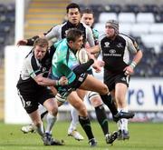 21 February 2010; Ashley Beck, Ospreys, is tackled by Sean Cronin, Connacht. Celtic League, Ospreys v Connacht. Liberty Stadium, Swansea, Wales. Picture credit: Steve Pope / SPORTSFILE
