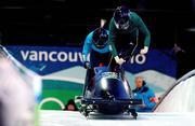 22 February 2010; Aoife Hoey, Ireland, pilot, in action with team-mate Claire Bergin, brakeswoman, during the Women's Bobsleigh training heats at the Whistler Sliding Centre, Whistler. Vancouver Winter Olympics, Vancouver, Canada. Picture credit: Tim Clayton / SPORTSFILE