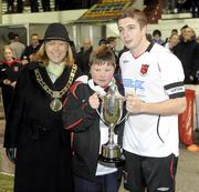 18 February 2010; Lord Mayor of Dublin Emer Costello, along with Killian Moran, grandchild of Jim Malone, presents the Jim Malone Cup to Dundalk captain Shaun Kelly. Jim Malone Cup, Dundalk v Drogheda United, Oriel Park, Dundalk, Co. Louth. Picture credit: Oliver McVeigh / SPORTSFILE