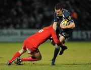 20 February 2010; Jonathan Sexton, Leinster, is tackled by Rhys Priestland, Scarlets. Celtic League, Leinster v Scarlets. RDS, Dublin. Picture credit: Stephen McMahon / SPORTSFILE