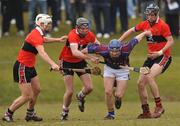 24 February 2010; Paddy Stapleton, UL, in action against, from left, Ritchie Foley, Bill Beckett and Robert White, UCC. Ulster Bank Fitzgibbon Cup Quarter-Finals, University of Limerick v University College Cork, University of Limerick, Limerick. Picture credit: Diarmuid Greene / SPORTSFILE