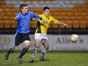 24 February 2010; David O'Sullivan, DIT, in action against Michael Leahy, UCD. CUFL Umbro - Premier Division Final, University College Dublin v Dublin Institute of Technology, Tolka Park, Dublin. Picture credit: David Maher / SPORTSFILE