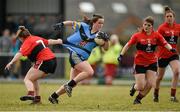 11 March 2016; Nicola Ward, University College Dublin, is tackled by Mairead Corkery, University College Cork. O'Connor Cup Semi-Final - University College Cork v University College Dublin. John Mitchels GAA Club, Tralee, Co. Kerry.  Picture credit: Brendan Moran / SPORTSFILE