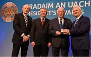 11 March 2016; Denis Hurley, centre right, Sarsfield Hurling Club, Cork, is presented with his GAA President's Award for 2016 by Uachtarán Chumann Lúthchleas Aogán Ó Fearghail, right. Also pictured, from left, Pól Ó Gallchóir, TG4, and Denis O'Callaghan, AIB. Croke Park, Dublin. Picture credit: Cody Glenn / SPORTSFILE
