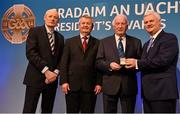 11 March 2016; Denis Hurley, centre right, Sarsfield Hurling Club, Cork, is presented with his GAA President's Award for 2016 by Uachtarán Chumann Lúthchleas Aogán Ó Fearghail, right. Also pictured, from left, Pól Ó Gallchóir, TG4, and Denis O'Callaghan, AIB. Croke Park, Dublin.  Picture credit: Cody Glenn / SPORTSFILE