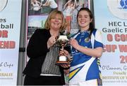12 March 2016; St Patrick's College captain Shauna Ennis is presented with the Giles Cup by Marie Hickey, President, Ladies Gaelic Football Association, after the game. Giles Cup Final 2016, St Patrick's College, Drumcondra, v Mary Immaculate College, Limerick. John Mitchels GAA Club, Tralee, Co. Kerry. Picture credit: Brendan Moran / SPORTSFILE