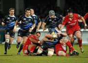 20 February 2010; Sean O'Brien, Leinster, is tackled by Deacon Manu, left, and Rob McCusker, Scarlets, resulting in an injury forcing O'Brien to be replaced. Celtic League, Leinster v Scarlets. RDS, Dublin. Picture credit: Stephen McMahon / SPORTSFILE