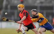 21 February 2010; Brendan Ennis, Down, in action against Alan Brigdale, Clare. Allianz GAA Hurling National League, Division 2 Round 1, Clare v Down. Cusack Park, Ennis, Co. Clare. Picture credit: Diarmuid Greene / SPORTSFILE