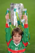26 February 2010; Seven-year-old GAA Star of the future Charlie McHugh, from the Naomh Barróg GAA Club, Kilbarrack, Dublin, with the Liam MacCarthy Cup at the announcement of a new partnership with Centra and its 558 retail partners. Centra have been confirmed as an official sponsor of the GAA Hurling All-Ireland Championship. Croke Park, Dublin. Picture credit: Ray McManus / SPORTSFILE