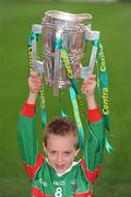 26 February 2010; GAA Star of the future Sean Byrne, seven years, from the Naomh Barróg GAA Club, Kilbarrack, Dublin, with the Liam MacCarthy Cup at the announcement of a new partnership with Centra and its 558 retail partners. Centra have been confirmed as an official sponsor of the GAA Hurling All-Ireland Championship. Croke Park, Dublin. Picture credit: Ray McManus / SPORTSFILE