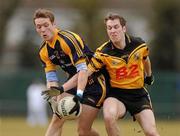 26 February 2010; Paul Flynn, DCU, in action against Paul Cashin, NUI Maynooth. Ulster Bank Sigerson Cup Semi-Final, National University of Maynooth v Dublin City University, Pairc na Gael, North Campus, NUI Maynooth, Co. Kildare. Picture credit: Pat Murphy / SPORTSFILE