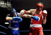 20 February 2010; Kenny Egan, Neilstown, red, and Denis Hogan, Grangecon, blue, exchange punches during their 81kg bout. National Boxing Championships - Semi-Finals, National Stadium, Dublin. Picture credit: Stephen McCarthy / SPORTSFILE