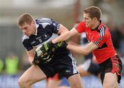 27 February 2010; Gary O'Driscoll, IT Tralee, in action against Patrick Burke, Trinity College. Ulster Bank Trench Cup Final, Institute of Technology Tralee v Trinity College, Leixlip GAA Club, Leixlip, Co. Kildare. Picture credit: Pat Murphy / SPORTSFILE