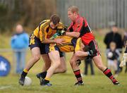 27 February 2010; Seamus Hayes, UCC, in action against Philip McMahon and Bryan Cullen, left, DCU. Ulster Bank Sigerson Cup Final, Dublin City University v University College Cork, Leixlip GAA Club, Leixlip, Co. Kildare. Picture credit: Pat Murphy / SPORTSFILE