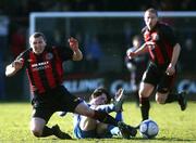 27 February 2010; Jason Byrne, Bohemians, is tackled by Gareth Tommons, Coleraine. Setanta Cup, Bohemians v Coleraine, The Showgrounds, Coleraine, Co. Derry. Picture credit: Colm O'Reilly / SPORTSFILE