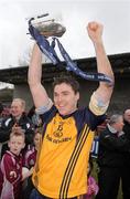 27 February 2010; Paddy Andrews, DCU, celebrates with the Sigerson Cup. Ulster Bank Sigerson Cup Final, Dublin City University v University College Cork, Leixlip GAA Club, Leixlip, Co. Kildare. Picture credit: Pat Murphy / SPORTSFILE