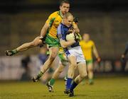 27 February 2010; Aodhan Gallagher, St. Gall's, is tackled by Damien Burke, Corofin, who received a yellow card. AIB GAA Football All-Ireland Senior Club Championship Semi-Final Refixture, Corofin v St. Gall's, Parnell Park, Dublin. Picture credit: Ray McManus / SPORTSFILE