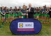 12 March 2016; Captain Emma Lawlor, Scoil Chríost Rí, Portlaoise, receives the cup from Finbar O'Driscoll, Leinster President Ladies GAA. Lidl All Ireland Junior A Post Primary Schools Championship Final 2016, Scoil Chríost Rí, Portaoise, v St Ronan's College Lurgan, Armagh. Park Oliver Plunketts, Drogheda, Co. Louth. Picture credit: Oliver McVeigh / SPORTSFILE